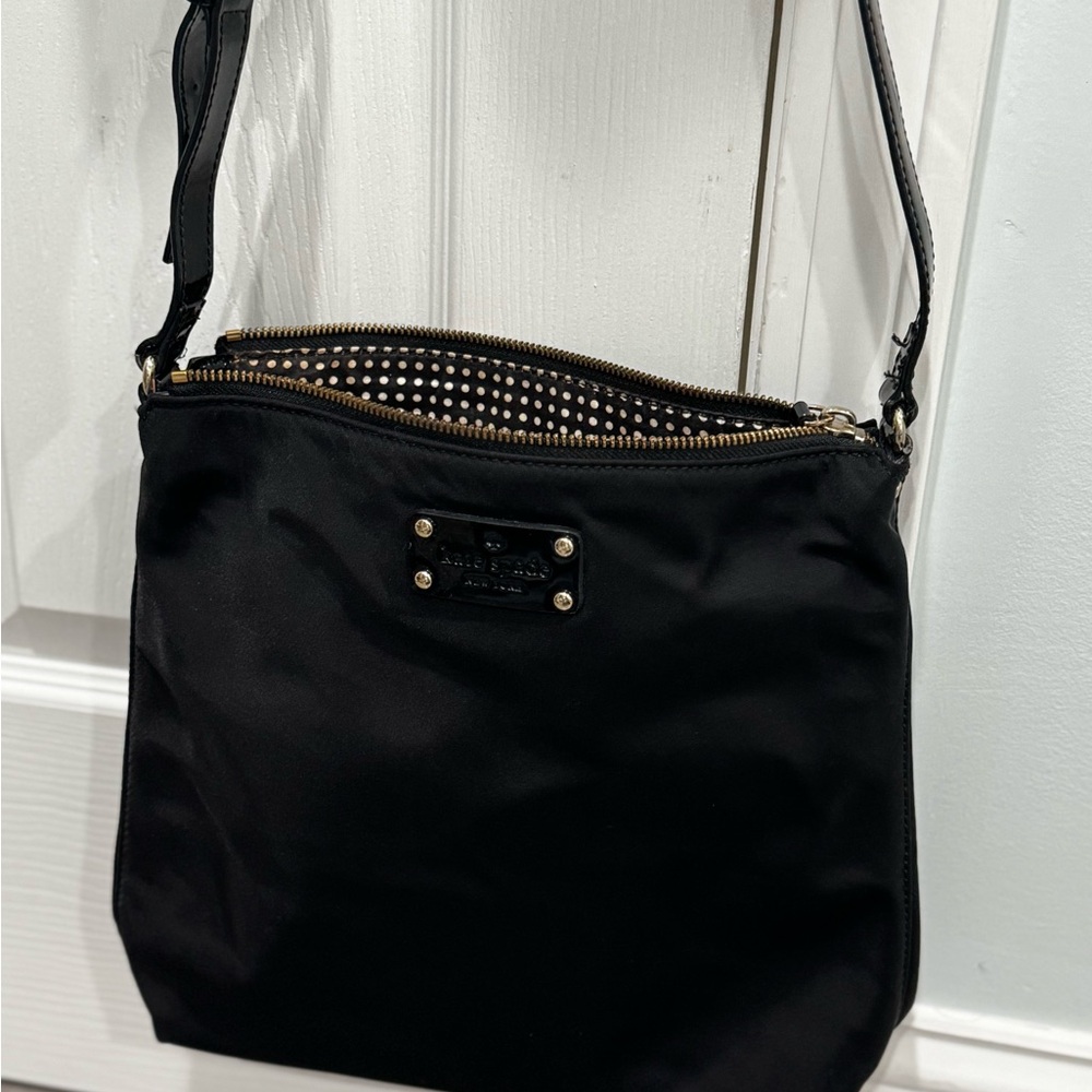 Kate Spade Black Crossbody Bag with Polka Dot Interior, soft material